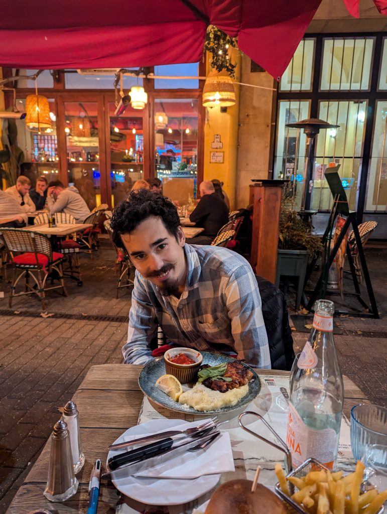 Sam's first meal in Hungary, the national dish called Goulash; very yummy!