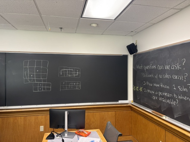 Different size grids with two dots in two grid cells. Can you find a path linking the two that goes through each other grid cell exactly once?