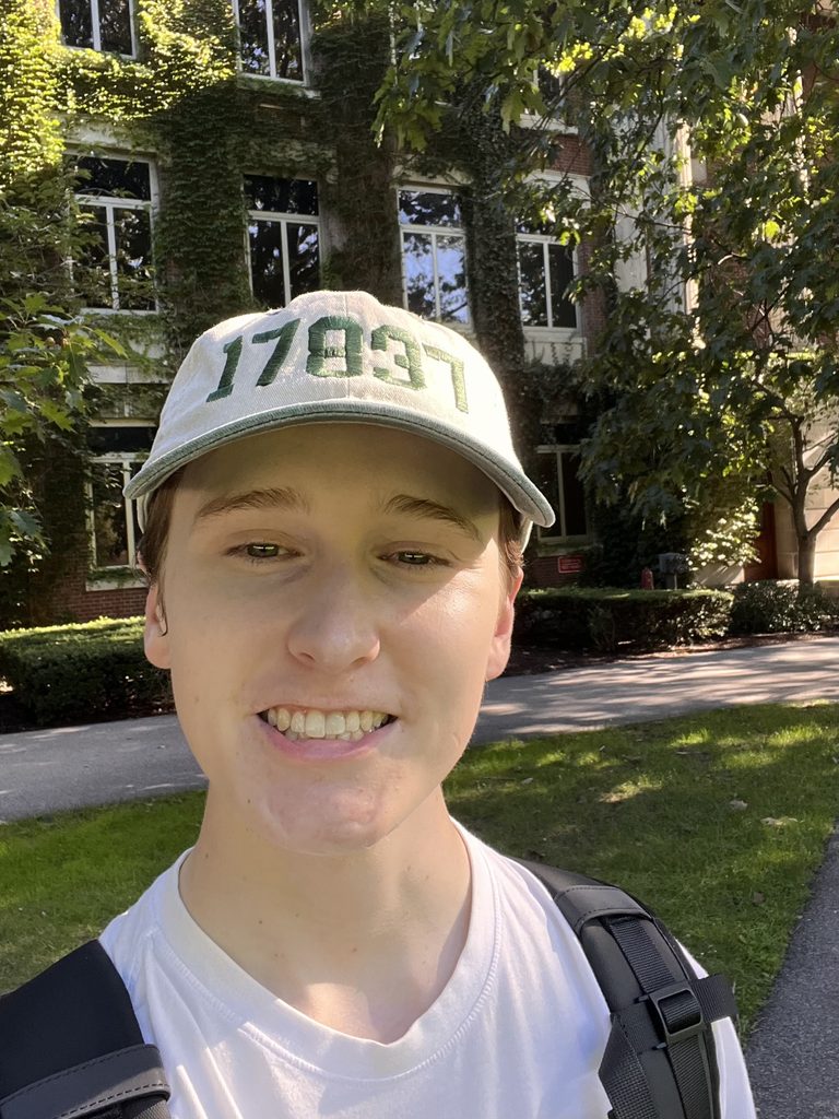 Austin representing Lewisburg with a zipcode hat standing in Rochester
